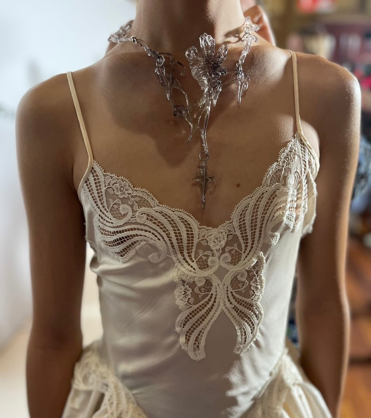 Model wearing lavender 3D printed statement resin necklace