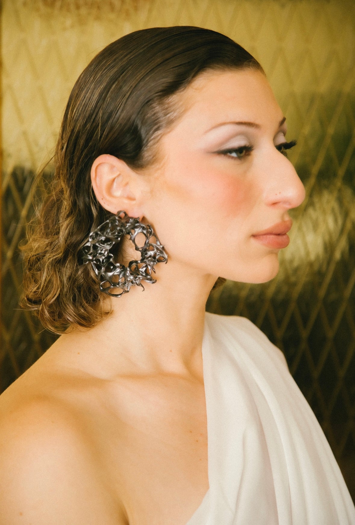 '𝒪𝓃𝓎𝓍𝒶' (Large)