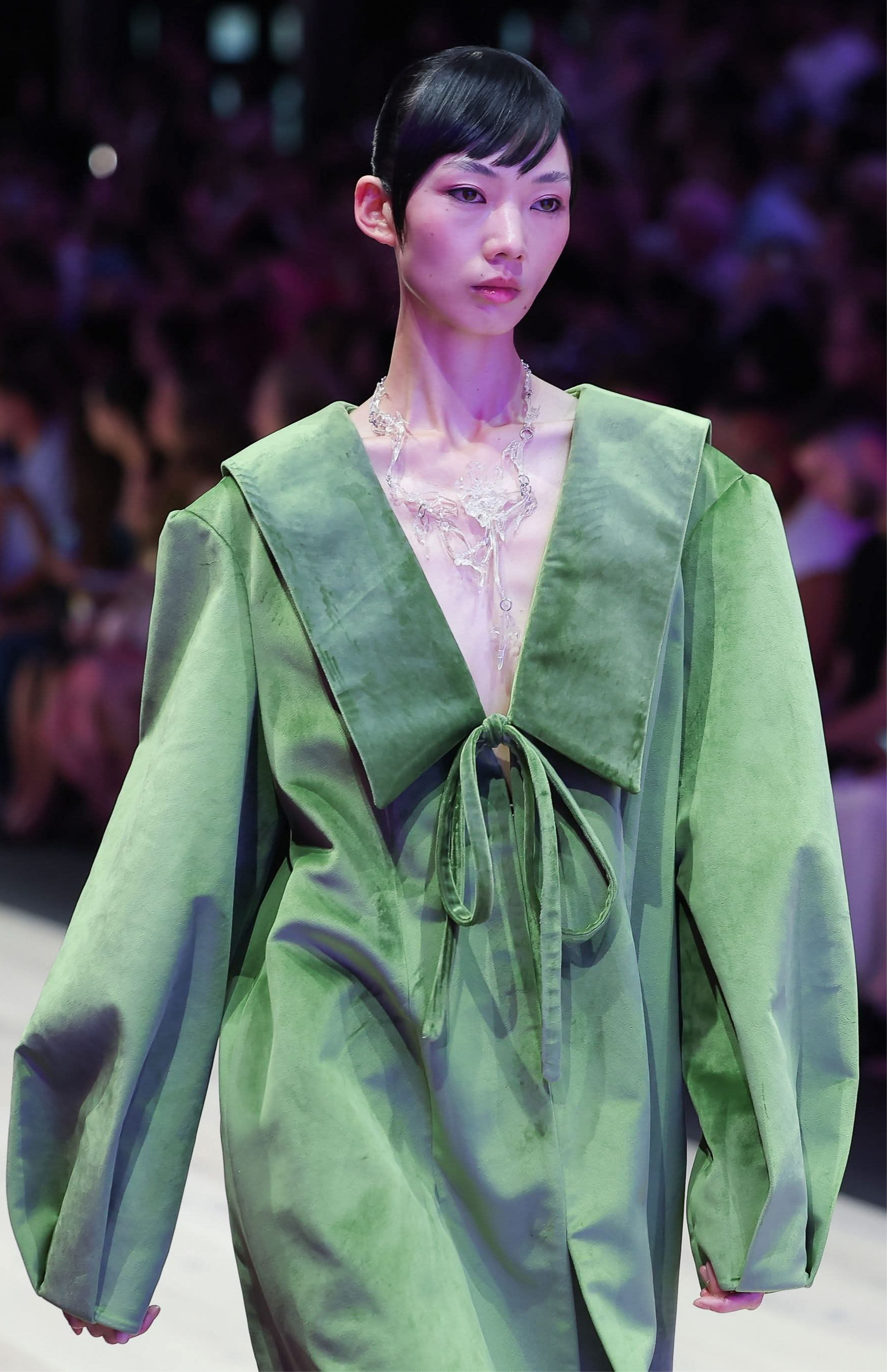 Model wearing a clear gloss translucent 3D printed statement resin floral necklace