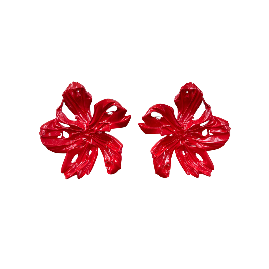Pair of red floral statement resin 3D printed earrings on a white background