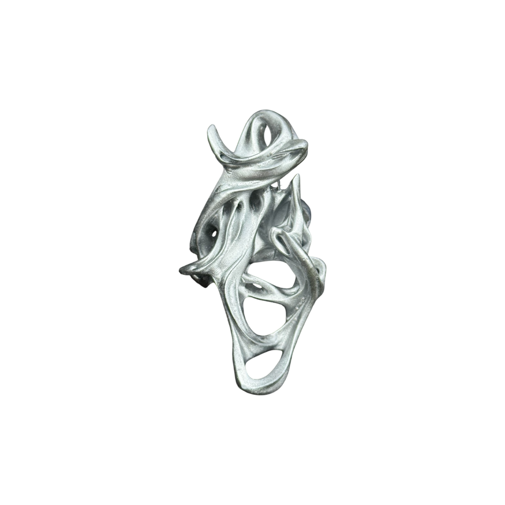 Silver ring with a unique design on a white background