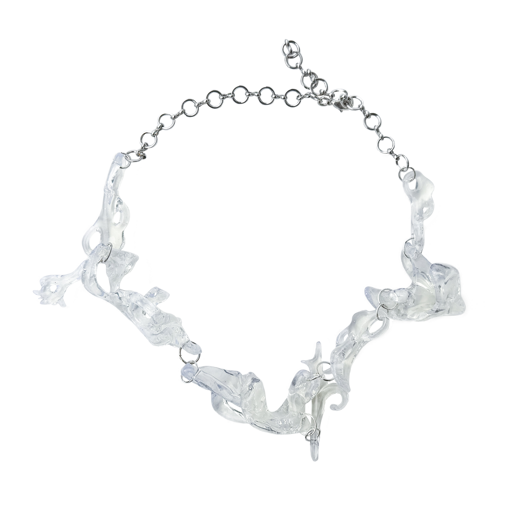 Clear glass like necklace on a white background